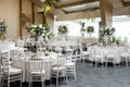 Restaurant banquet hall with served decorated wedding tables