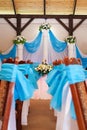 A restaurant banquet room decorated for a wedding party