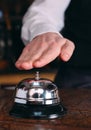 Restaurant bell vintage with hand. Hotel service bell Royalty Free Stock Photo