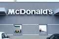 restaurant building McDonald\'s with logo, fastfood restaurant chain, corporation operating in food service industry, Royalty Free Stock Photo