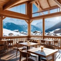 Restaurant or cafe in chalet with view of majestic snowy apls in skiing