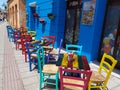 Restaurant cafe in preveza city greece multicolortables and chairs flowers pots Royalty Free Stock Photo