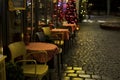 a restaurant or cafe. Tables and chairs in the outdoor restaurant. There are no visitors at the restaurant for dinner. Royalty Free Stock Photo