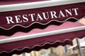 RFrench restaurant sidewalk cafe sign Paris France Royalty Free Stock Photo