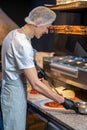 Chef working in the kitchen in the restaurant Royalty Free Stock Photo