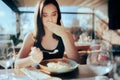 Restaurant Customer Eating her Meal Feeling Sick