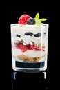 Restaurant dessert served in a glass on a dark background Royalty Free Stock Photo