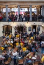 Restaurant entitled `Crusting Pipe` in the piazza at Covent Garden historic market, London UK