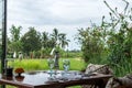 Restaurant facing the rice fields in Bali, Indonesia. Traditional Balinese restaurant facing the rice fields. Royalty Free Stock Photo