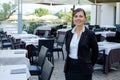 Restaurant female waiter with a tray