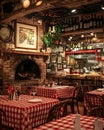 Restaurant with a fireplace and a red and white checkered tablecloth Royalty Free Stock Photo