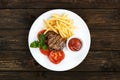 Restaurant food - beef grilled steak with french fries Royalty Free Stock Photo