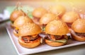 Restaurant food mini burger table with snack delicious dining. Catering service Royalty Free Stock Photo