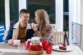 Restaurant. a guy with a girl drink hot coffee and tea