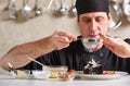 Restaurant hotel private chef preparing dessert chocolate cake Royalty Free Stock Photo