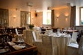 Restaurant interior with served tables