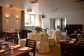 Restaurant interior with served tables