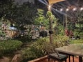 restaurant with jungle tree and small waterfall Royalty Free Stock Photo