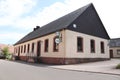 Restaurant in a long wooden building in Potzbach, Germany Royalty Free Stock Photo