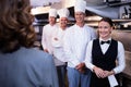 Restaurant manager briefing to his kitchen staff Royalty Free Stock Photo