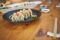 Restaurant, meal and closeup of sushi on a plate for luxury, healthy and authentic Asian cuisine. Platter, fine dining Royalty Free Stock Photo