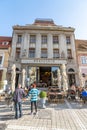 Restaurant in an old mansion on the central square of the old Brasov in Romania Royalty Free Stock Photo