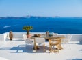 A restaurant overlooking caldera, Santorini Island, Greece. Lunch and dinner overlooking the sea.