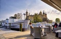 Restaurant on the pier on Lake Schwerin, with boats and overlooking the castle