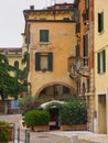 Restaurant in a quiet cobbled street, Verona, Italy Royalty Free Stock Photo