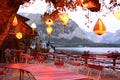 Restaurant with red latterns lights near lake