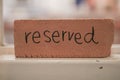 Restaurant reserved table sign. Restaurant reservation service. Royalty Free Stock Photo