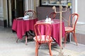 The restaurant`s intreer and a cafe with tables, chairs and covered, served dishes, a table for lunch. tablecloth