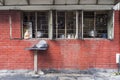 Restaurant`s kitchen seen from the street through the windows in the Philippines Royalty Free Stock Photo