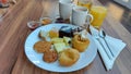 Restaurant scene. Plate with sweets.