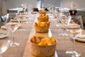 Restaurant table for multiple diners with bread baskets