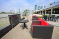 Restaurant seats and tables near the river, restaurant interior.