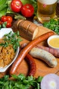 Restaurant service concept. Assorted German sausages. Close-up still life Royalty Free Stock Photo
