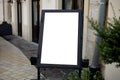 Restaurant sidewalk chalkboard sign board. Blank store signage sign design. White mock up of blank cafe menu stand on a