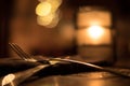Restaurant Silverware and Candle Bokeh Royalty Free Stock Photo