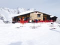 Restaurant and skis on slope in Les Houches, Chamonix winter resort Royalty Free Stock Photo