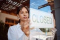 Restaurant small business, closed sign and waiter woman at local coffee shop startup finish service. Hospitality Mexico Royalty Free Stock Photo