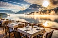 Restaurant surrounded by mist lake and mountains Royalty Free Stock Photo