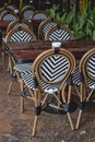 Restaurant table and chairs settings in outdoor dinning area Elegant chair with stylish wood surface tabletop.