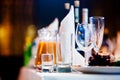 Restaurant table with glasses and napkins Royalty Free Stock Photo