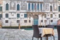 Restaurant table near the canal in Venice, Italy Royalty Free Stock Photo