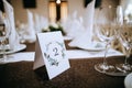 Restaurant table number. Decoration of wedding tables for dinner Royalty Free Stock Photo