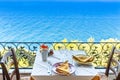 Restaurant table overlooking the sea on the Amalfi coast in Italy Royalty Free Stock Photo