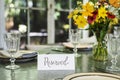 Restaurant table setting service with reserved card Royalty Free Stock Photo