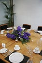 Restaurant table setup with cut flowers