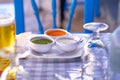 Restaurant table with three .typical sauces of the Canary Islands, called